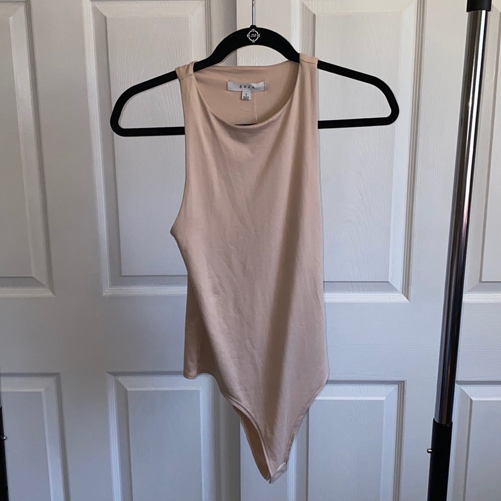 Tan/nude size Small bodysuit never worn!